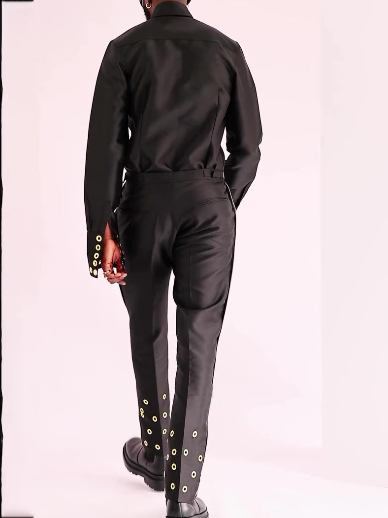 Chic Black Formal Ensemble With Adjustable Eyelet Trim And Structured Silhouette